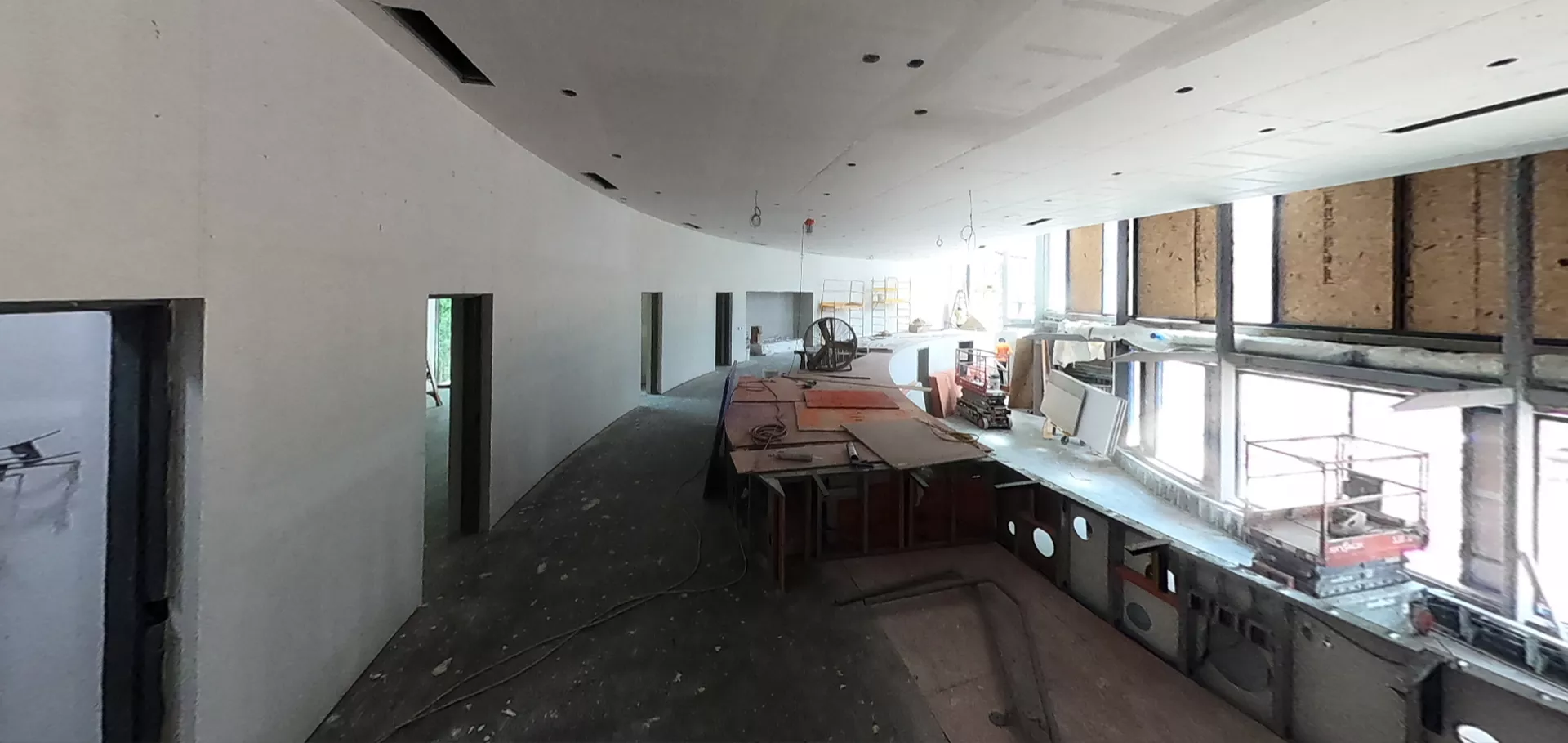 Internal view with multiple doorways and long corridor