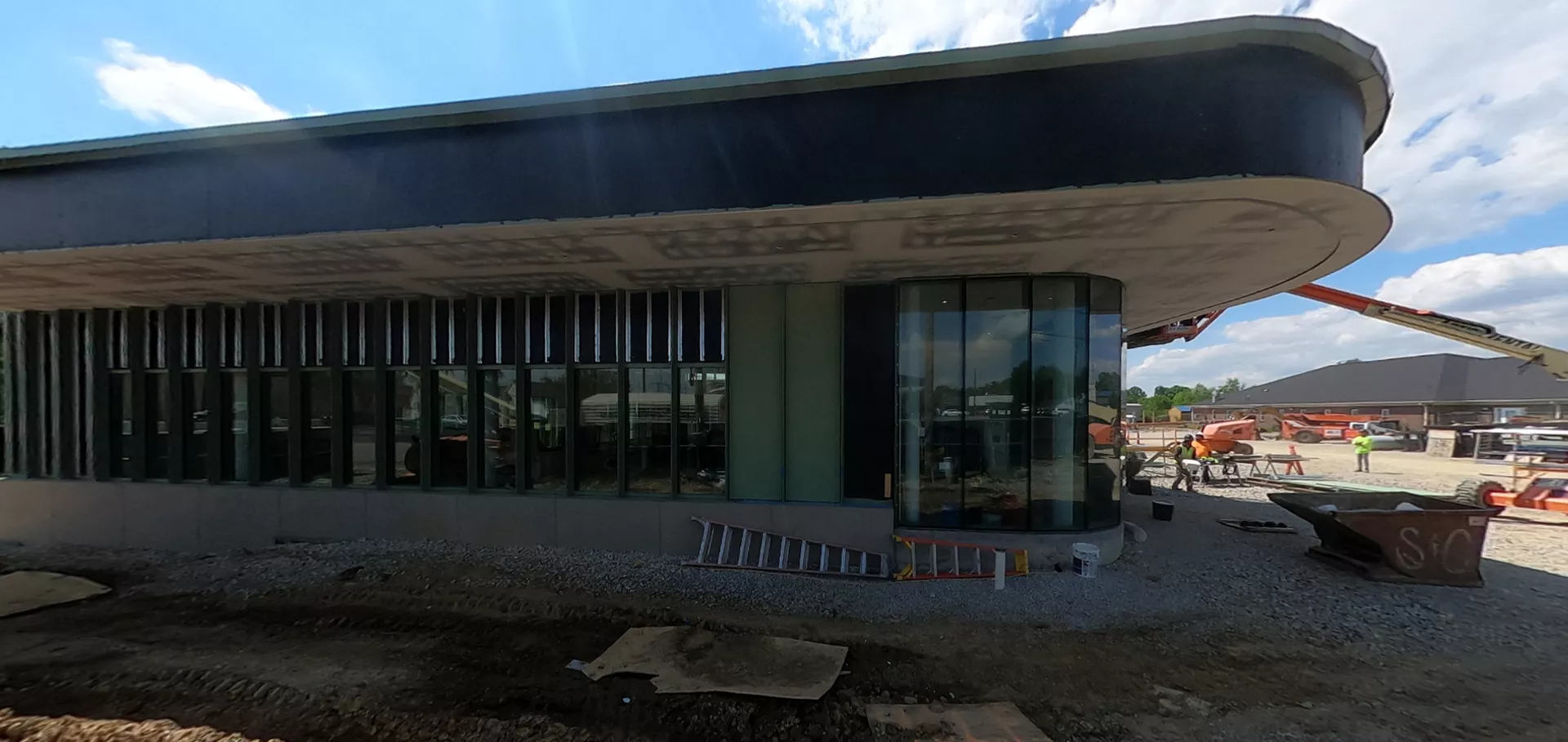 Side view of Fern Creek building facing glass windows